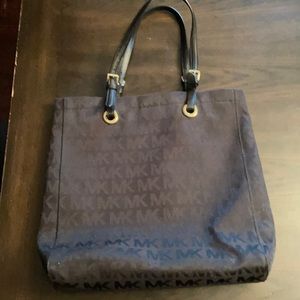 Michael Kors black logo tote bag.